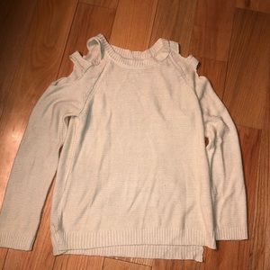 Long sleeve white sweater with cut outs at the shoulder. Brand: Tobi Size: Small
